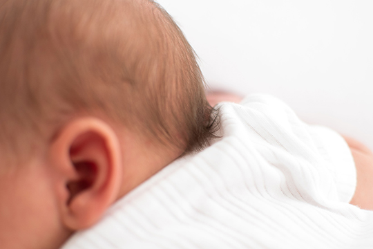 tuft of baby hair